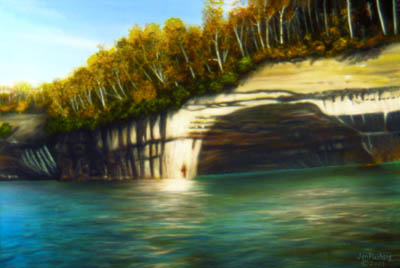 Rainbow Cave Pictured Rocks Coast Michigan autumn trees over looking rugged coastline rocks